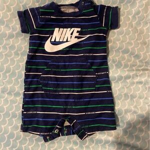 Newborn Nike bodysuit.